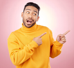 Aufkleber - Pointing finger, advertising and a man in studio with a wow announcement, promotion or decision. Face of male asian model with hands for marketing sale, news or presentation on a pink background