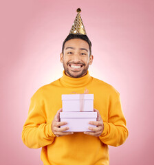 Canvas Print - Man, portrait and present for birthday party, prize and giveaway celebration or success on pink background. Excited asian person or winner with gift boxes for retail competition or sale in studio