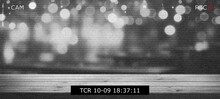 A Background And Texture Of Cctv Recode In The Bar Cafe  In Night  With Wooden Table Top On Blur Bokeh Abstract Background. 
