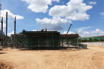 Wall Mural - Construction work of the structure building by workers in the factory industrial.