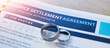 Ring, lawyer and paperwork for a divorce agreement, legal certificate or document for marriage. Closeup of deal, court and attorney report on end of relationship or contract for family law on a desk