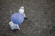 High angle view of two women walking on a cobblestone street in Addis Ababa, Ethiopia