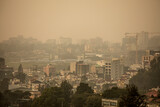 Fototapeta Sawanna - The Ethiopian city of Addis Ababa with heavy haze, smog, and air pollution