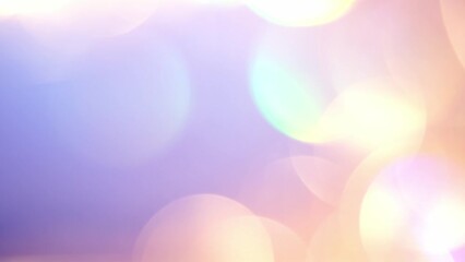Wall Mural - Abstract background golden bokeh on a purple background of pastel shades. Natural defocused effect. Blurred circles and light leaks in motion.