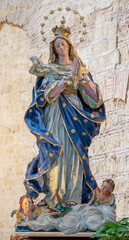 Wall Mural - NAPLES, ITALY - APRIL 22, 2023: The carved polychrome statue of Immaculate Conception in the church Basilica di San Giovanni Maggiore by unkonwn artist from year 1630.
