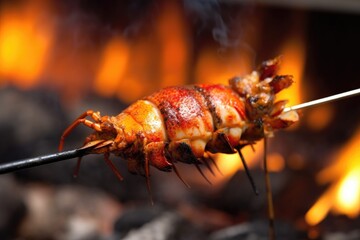 Canvas Print - close-up of lobster being cooked on a skewer, created with generative ai