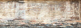 Fototapeta  - Empty Old Brick Wall Texture. Painted Distressed Wall Surface. Grungy Wide Brickwall. Grunge Red Stonewall Background. Shabby Building Facade With Damaged Plaster. Abstract Web Banner. Copy Space.