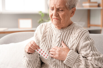 Sticker - Elderly woman with pills having heart attack at home