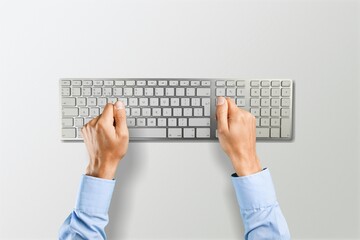 Wall Mural - Business person hands on the computer keyboard