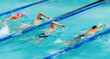 © xy - Group of men swimming during a competition