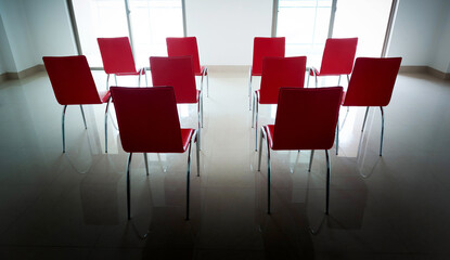 Wall Mural - Group of red chairs in ordinary empty waiting room