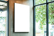 Leinwandbild Motiv Mockup image of Blank billboard white screen posters for advertising, Blank photo frames display in coffee shop for your design