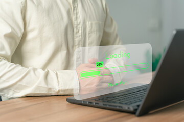 Poster - User use a laptop computer to download and update software with waiting to load digital file data from the website, and very slow internet from wifi. Concept of waiting for a load of loading symbol.