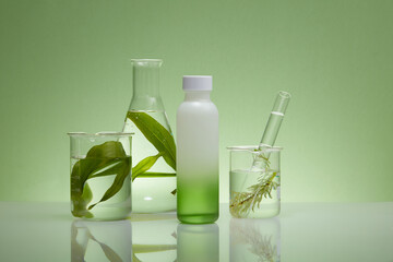 Wall Mural - Front view of a bottle unbranded displayed on green background with flasks containing seaweed leaves. Mockup for design, organic cosmetics, beauty products concept with natural extract