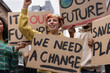 © ReeldealHD images - Young adult female protester raising her fist up