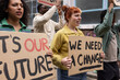 © ReeldealHD images - Young adult female campaigner shouting at a demonstration