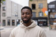 © ReeldealHD images - Portrait of young adult black male student on city street