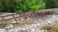 Aerial Shot Of Damaged Railroad Tracks In Vermont Post-Historic 2023 Flooding, Ground Erosion Visible