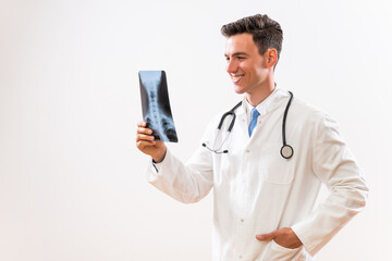 Wall Mural - Portrait of doctor doctor holding x-ray image .	