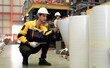 © Nassorn - Latino industrial engineer wears safety helmet work in heavy metal engineering factory. Hispanic worker in white hard hat checking product materials equipment in metalwork manufacturing facility