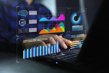 businessman or data scientist working on laptop with business dash board analytics chart metrics kpi