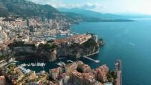 Monte Carlo, Monaco City aerial panoramic view with Prince's Palace, Saint Nicholas Cathedral and Museum of Oceanography around Port de Fontvieille in French Riviera near France in Europe 4K UHD
