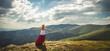 © nickolya - Young woman on the top of mountain