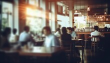 Blurred Restaurant Background With Some People Eating