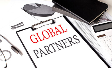 Poster - GLOBAL PARTNERS text on paper clipboard with chart and notebook on withe background