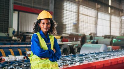 Portrait of industrial worker inspecting and check up machine at factory machines. Technician working in metal sheet at industry. Foreman checking Material or Machine.