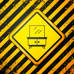 Sticker - Black Dressing table icon isolated on yellow background. Warning sign. Vector