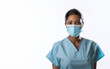 Beautiful Nurse Wearing a Facemask on a white background