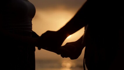 Wall Mural - people couple love silhouette loving young man woman holding hands beach togetherness love vacation travel