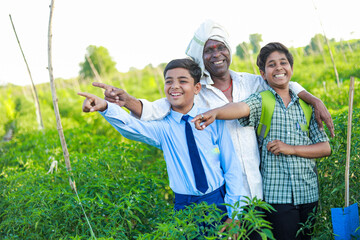 Wall Mural - Indian three people standing in farm