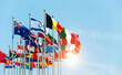 © xy - Set of flags fluttering in the wind against blue sky background
