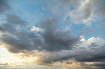 Wall Mural - Thunderclouds in the sky at sunset.