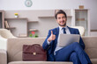 © Elnur - Young male employee working from home during pandemic