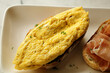 Breakfast dish. Open-Faced Sandwich  - omelette on toasted bread.