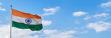Indian Flag In Front Of Clear Blue Sky - AI-Generated 