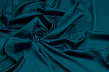 Wall Mural - Fabric satin silk drapery. Green textile