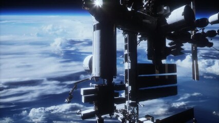 Wall Mural - spectacular sight of the rotating space station illuminated by the sun as viewed from a satellite. Elements of this image furnished by NASA