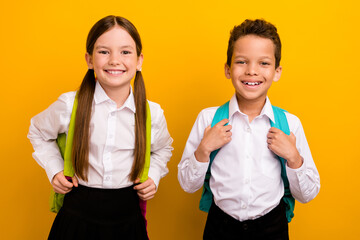 photo of cute adorable schoolkids prepared for 1 september buy school supply on season bargain isola