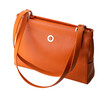 Fashionable orange women's handbag on a white background. Cut out. Isolated