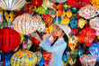 © tawatchai1990 - Asian woman wearing vietnam culture traditional and hoi an lanterns at Hoi An ancient town, Vietnam.