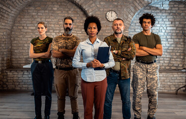 Wall Mural - Portrait of diverse veterans at PTSD support group.