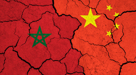 Flags of Morocco and China on cracked surface - politics, relationship concept