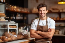 Young Smiling Man Wearing Apron Standing Behind Bakery Counter. Generative AI