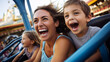 © Keitma - Mother and two children family riding a rollercoaster at an amusement park experiencing excitement, joy, laughter, and fun