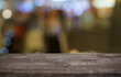 © Charlie's - Empty wood table top and blur of out door garden background Empty wooden table space for text marketing promotion. blank wood table copy space for background