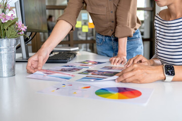 Advertising agency designer creative start-up team discussing ideas in office. 